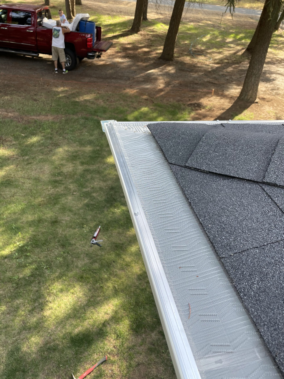 Leaf guard close-up on residential roof edge