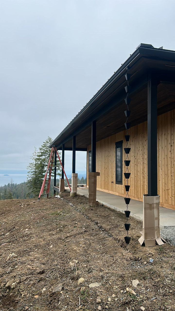 Building with rain chain during installation