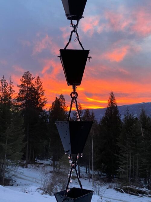 Rain chain installation on home