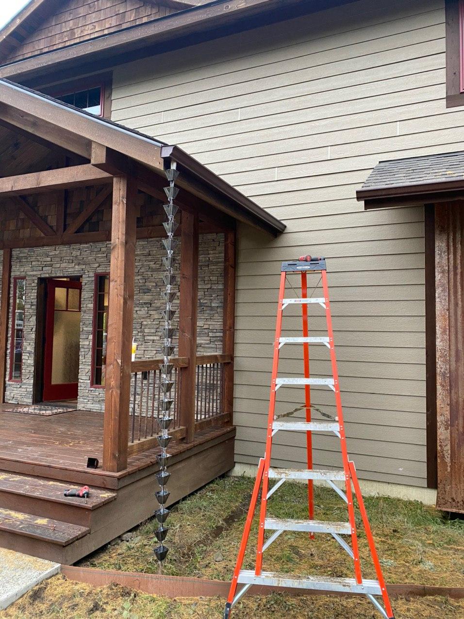 Rain chain detail on home exterior