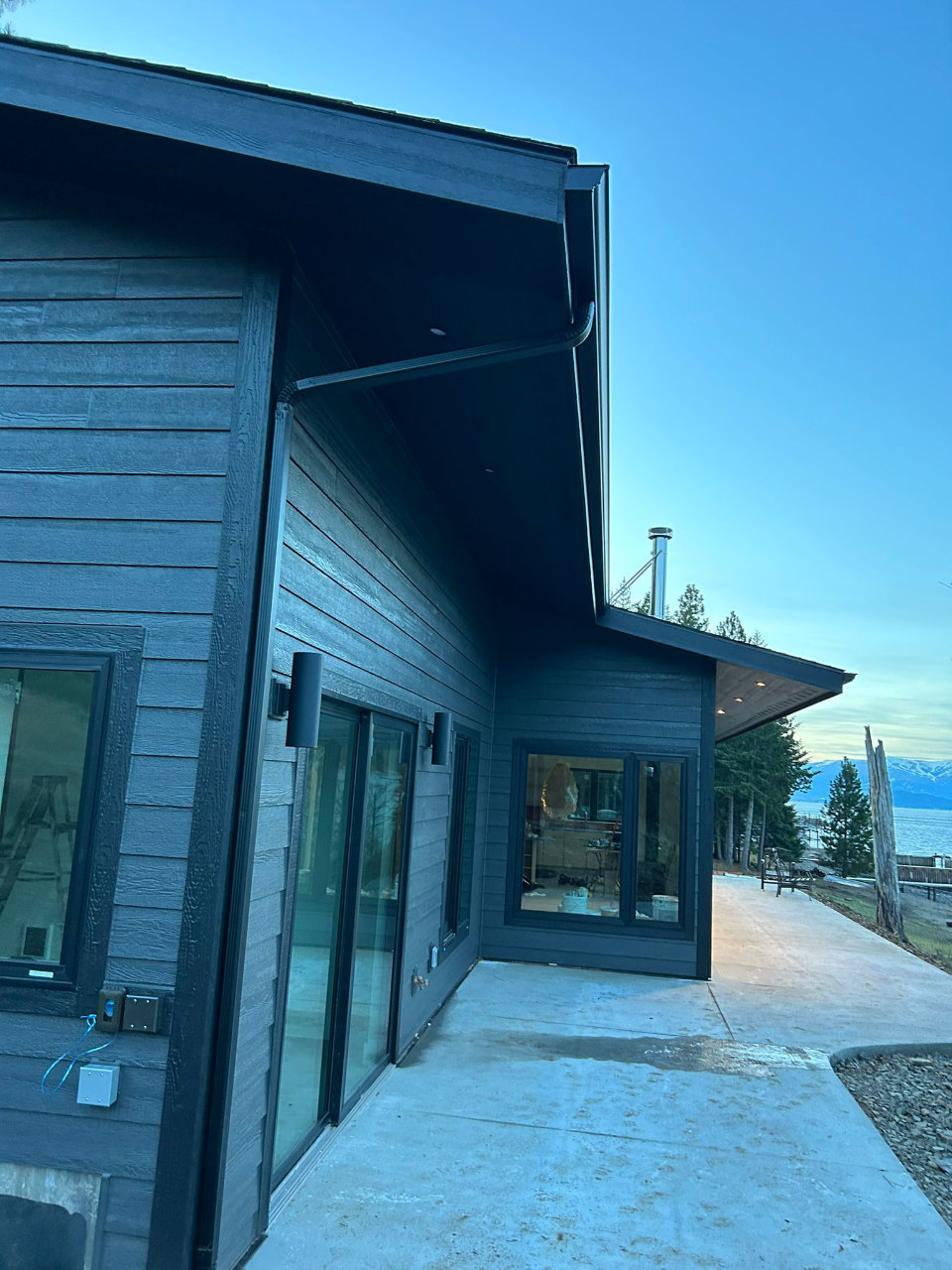 Home with large windows and new seamless gutters