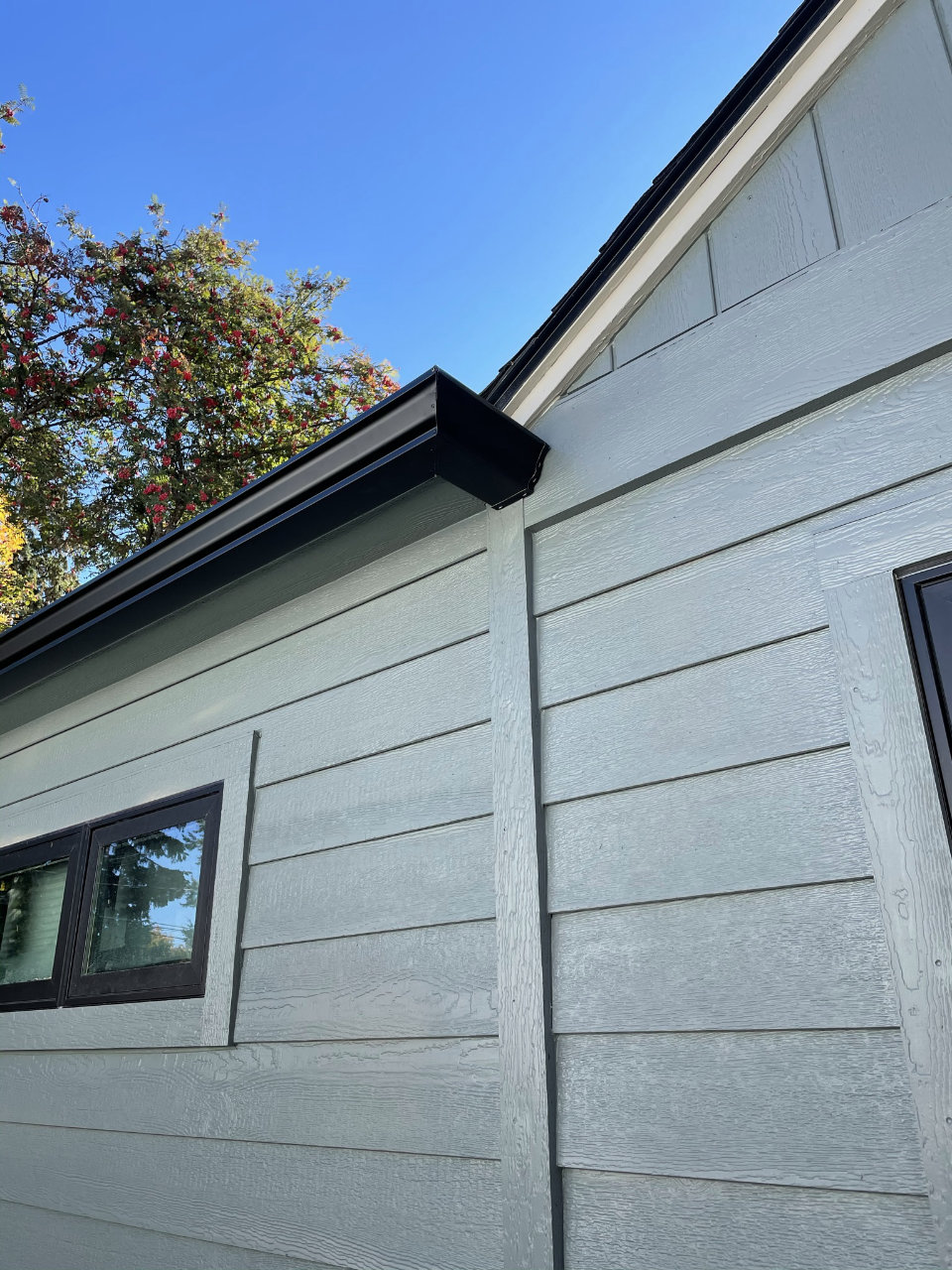 Completed gutter project on home exterior