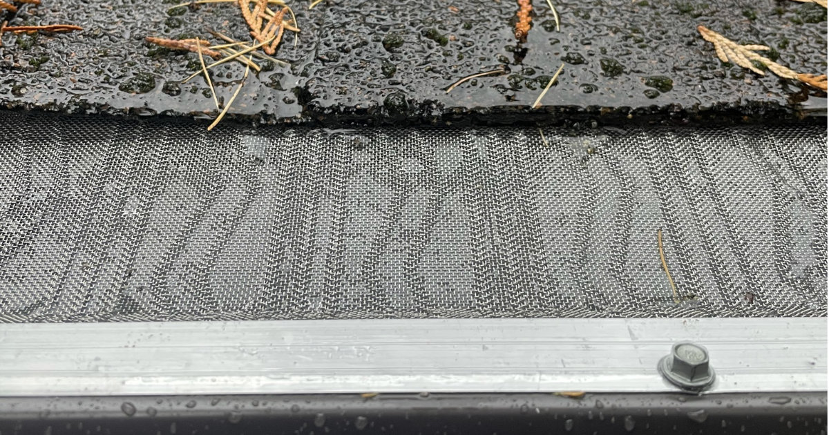 Leaf guard gutter cover installed on seamless gutters